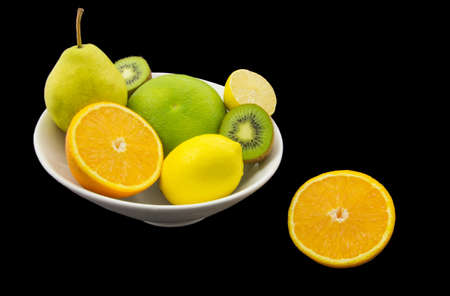 Juicy fruits isolated on black backgroundの写真素材