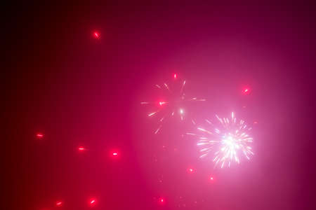 Red fireworks abstract backgroundの写真素材