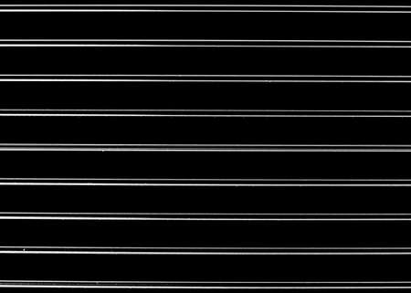 Horizontal parallel aluminum pipes abstract background or textureの写真素材