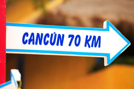 Cancun wooden direction signpost, Yucatan, Mexicoの写真素材