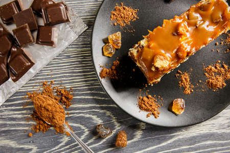 Delicious caramel pie on a wooden tableの写真素材