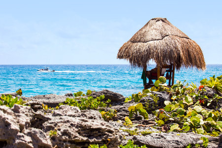 Lifeguard hut and turquoise caribbean sea in Mexicoの写真素材