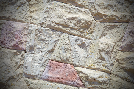Wall of sandstone blocks for background or texture