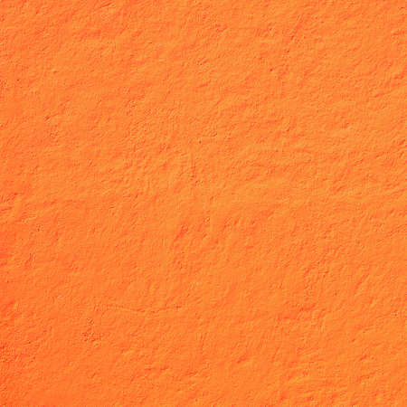 Blazing orange rough wall for backgroundの写真素材