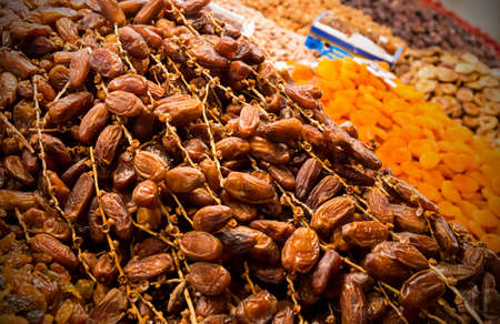 Dried fruits: dates and apricots at moroccan market in Marrakeshの写真素材