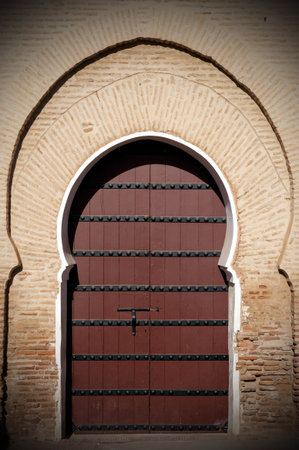 Old arabian door in Marrakesh city, Moroccoの写真素材
