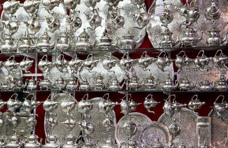 Collection of silver tea kettles in Marrakesh, Moroccoの写真素材