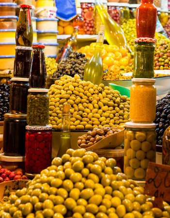Fresh olives and preserves at moroccan market in Marrakeshの写真素材