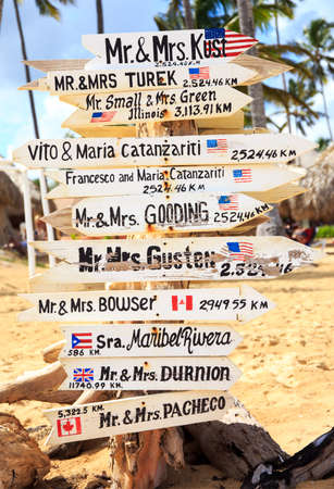 Funny direction signpost with names of newlywedsの写真素材