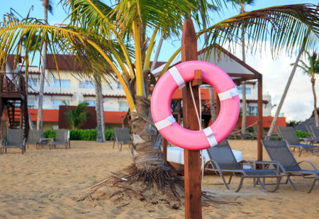 Life belt on caribbean beach in Dominican Republicの写真素材