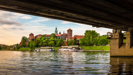 KRAKOW CRACOW POLAND MAY 09 2015: Panorama of antique royal Wawel castle and the Vistula river in...