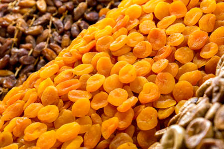 Dried fruits: apricots and dates at moroccan market in Marrakeshの写真素材