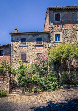 Narrow street of old Cortona town in Tuscanyの写真素材