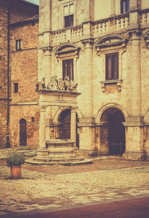 Antique well in beautiful small Montepulciano town, Tuscanyの写真素材