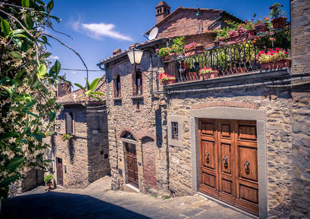 Narrow street of old Cortona town in Tuscanyの写真素材