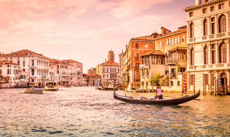 VENICE, ITALY - JUNE 29, 2015: Grand Canal scenery with a gondola in antique Venice, Italyのeditorial素材