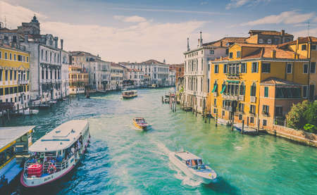 VENICE, ITALY - JUNE 29, 2015: Grand Canal with boats scenery in antique Venice, Italyのeditorial素材