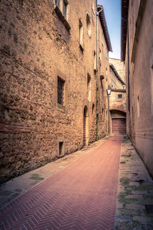 Dead end with old wooden doors in the backgroundの写真素材
