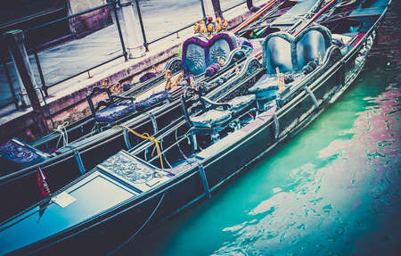 Close up of famous venetian gondolas, Italyの写真素材