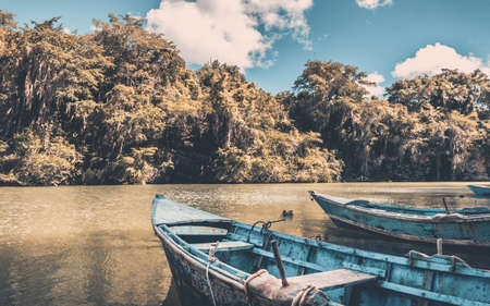 Caribbean blue wooden boats somewhere in Dominican Republicの写真素材