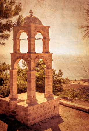 Greek stone bell tower. Textured effect applied.の写真素材