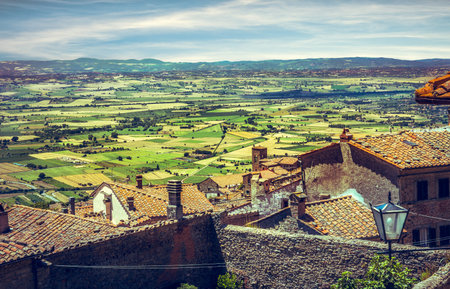 Aerial view of green tuscan fields. A view from Cortona antique town.の写真素材