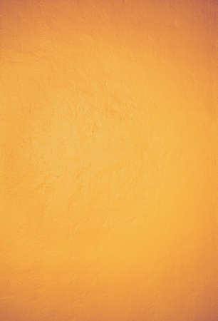 Mexican yellow rough wall for backgroundの写真素材