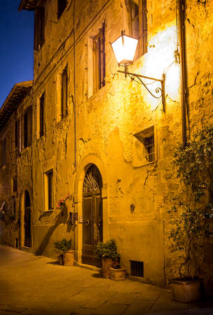 Beautiful street of tuscan Pienza town by nightのeditorial素材