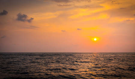 Beautiful sunset over Indian ocean in Maldivesの写真素材