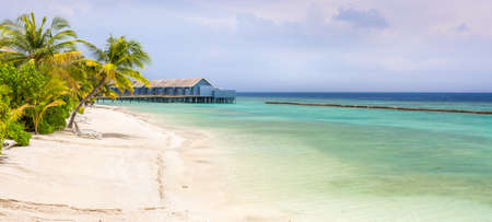 Unique beauty of blue lagoon on tropical island in Maldivesの写真素材