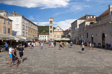 HVAR, CROATIA - JULY 30, 2016: Tourists visiting main square in Hvar village, Croatiaのeditorial素材