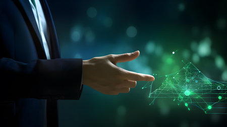 Business growth connection seen as a professional interacts with a graph in indigo.の素材