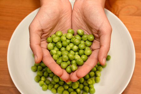 Hands Showing Fresh Green Beans