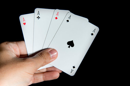 Hand Holding Playing Cards