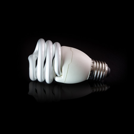 Energy Saving Bulb With Black Backgroundの写真素材