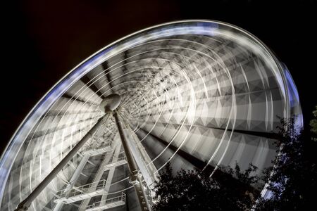 Long Exposure Night Shot Of A Ferris Wheelの写真素材