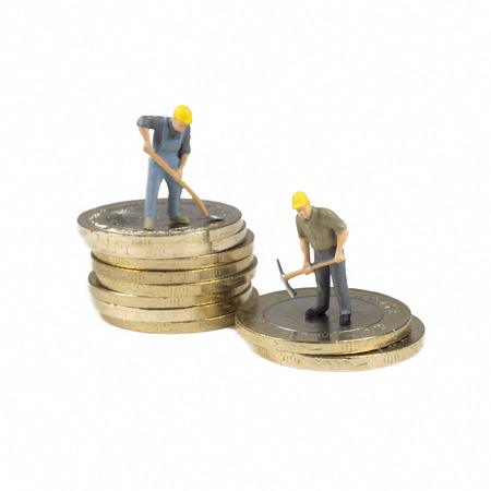 Workers On Top Of Turkish Coins Isolated On White Backgroundの写真素材
