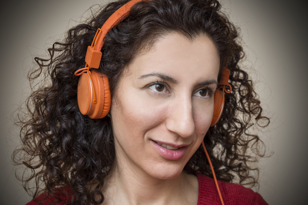 Woman Listening Music With Headphonesの写真素材