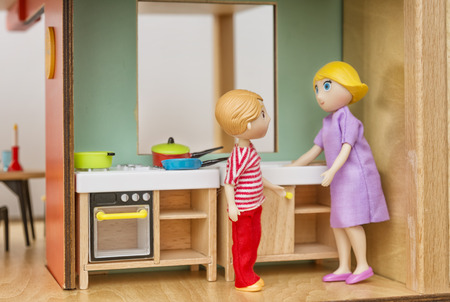 Miniature Mother And Son At The Kitchenの写真素材