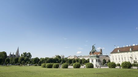 Green park area near Austrian National Library, the largest library in Austria, located in the Hofburg Palace complex in Vienna.のeditorial素材