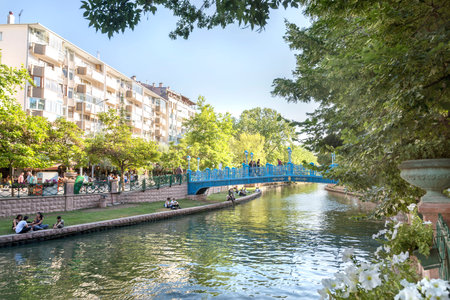 View of Porsuk River and a blue bridge from Adalar neighborhood of Eskisehir, Turkey.
