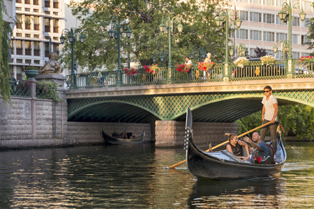 People having a sightseeing tour with gondola on Porsuk river, famous river running across the city centre of Eskisehir, Turkey.のeditorial素材