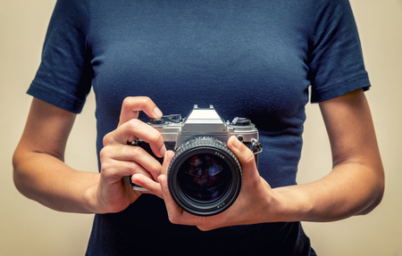 Woman Holding A Vintage Cameraの写真素材