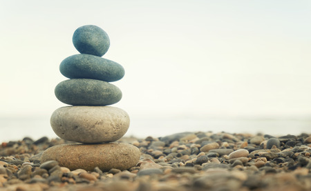 Stack Of Balanced Stones On The Beachの写真素材