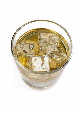 Glass Of Whisky With Ice Isolated On White Backgroundの写真素材