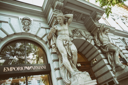 Statue at the entrance of the Emporio Armani store, an Italian luxury fashion brand was founded by Giorgio Armani. Budapest, Hungary.のeditorial素材