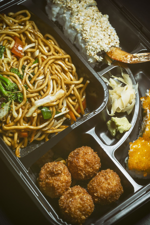 Traditional Set Of Asian Food On A Plastic Service Plateの写真素材