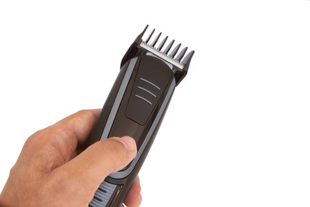 Male Hand Holding Hair Trimmer, Isolated On White Background