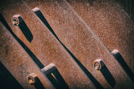 Brown Rusty Metal Panels With Iron Bolt And Nuts, Background Imageの写真素材