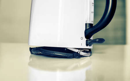 Broken Electric Kettle, Risk of Electric Shock, Poor Low Quality Product, Household Applianceの写真素材